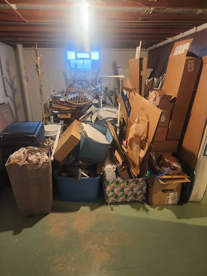 Roll-off dumpster container at job site for 2 Yard Dumpster Rental in Hobart